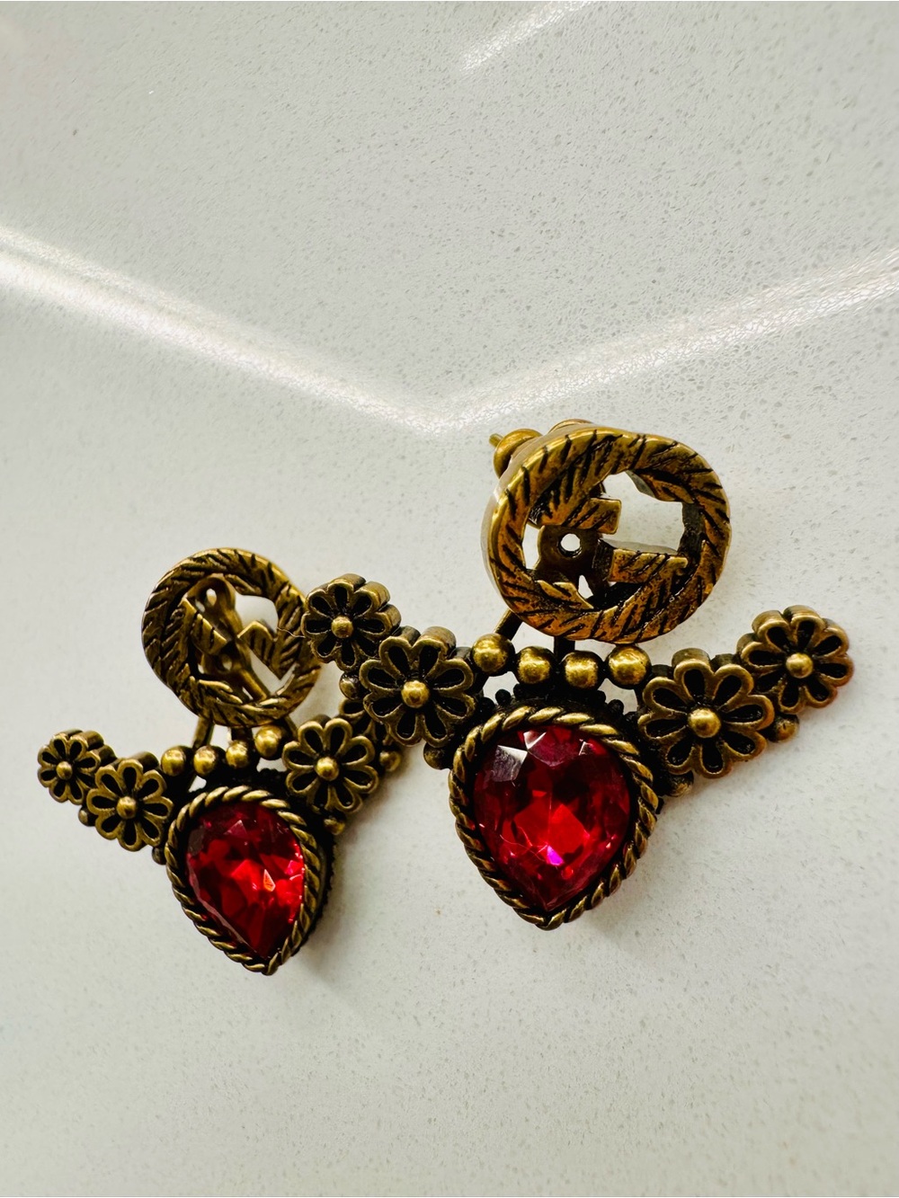 GUCCI Antique Gold Floral Drop Earrings with Red Teardrop Stone